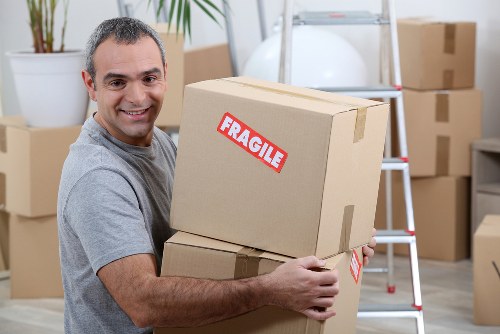 Student removals planning in Ickenham with packed boxes and moving van