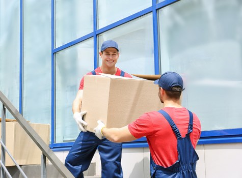 Man with van removal service helping a household move in Ickenham