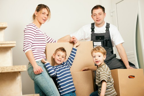 Professional movers handling furniture during house removals in Ickenham