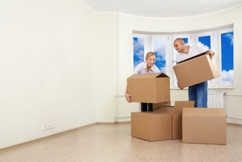 Office relocation equipment and boxes arranged for transfer
