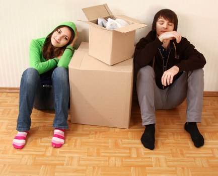 Fast local removals team handling boxes during an urgent Ickenham move