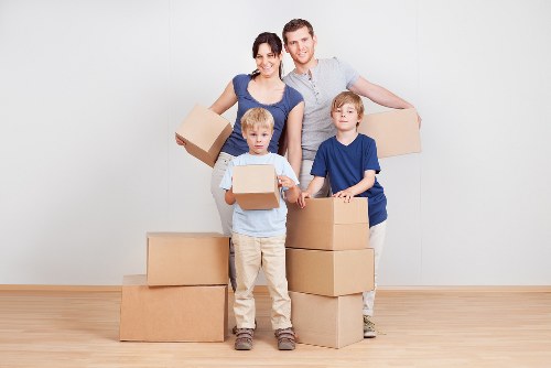 Planning flat removals in Ickenham with packed boxes and moving van