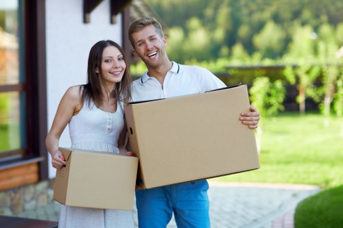 Careful packing of fragile household items during packing and unpacking services in Ickenham