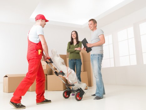Packed moving boxes ready for relocation in Ickenham