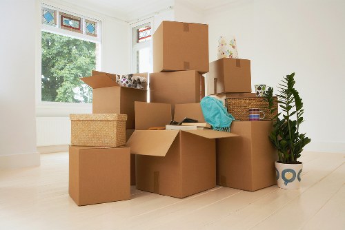 Moving team handling household belongings with packing and unpacking services in Ickenham