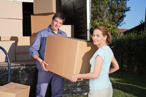 Boxes and furniture arranged for a load-based house move